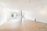 Exklusive Wohnatmosphäre: Neubau-Maisonette mit großzügigem 11,66 m² Südbalkon im Obergeschoss - Wohn- und Esszimmer