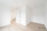 Exklusive Wohnatmosphäre: Neubau-Maisonette mit großzügigem 11,66 m² Südbalkon im Obergeschoss - Gäste- / Arbeitszimmer
