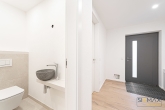 Exklusive Wohnatmosphäre: Neubau-Maisonette mit großzügigem 11,66 m² Südbalkon im Obergeschoss - Gäste-WC